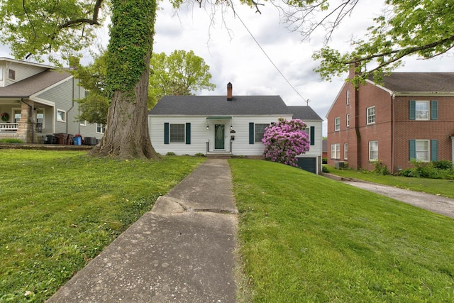 view of front of home with a front yard