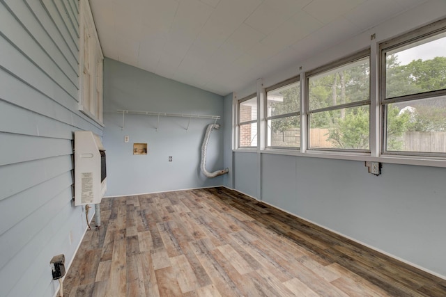 laundry area with washer hookup and wood finished floors