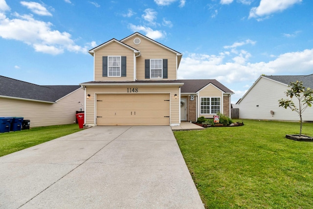 traditional home with driveway, a front yard, and an attached garage