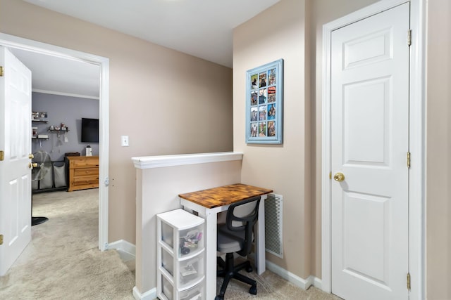 office space with carpet and baseboards