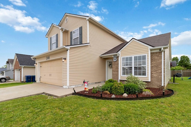 traditional-style home with driveway, brick siding, and a garage