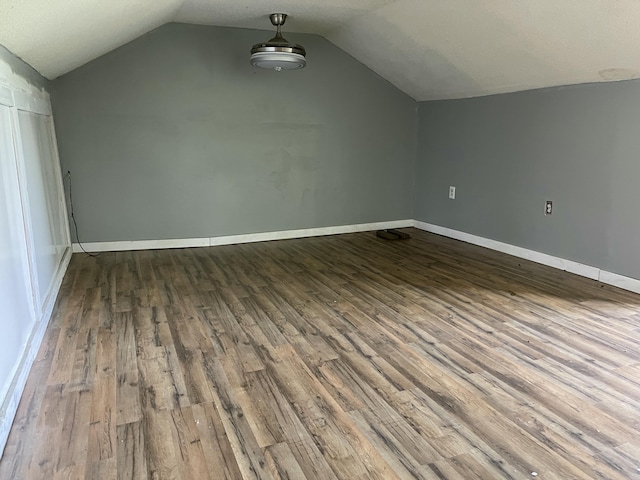 130 Branch Rd, Monticello, KY 42633 - bonus room with baseboards, wood finished floors, and lofted ceiling