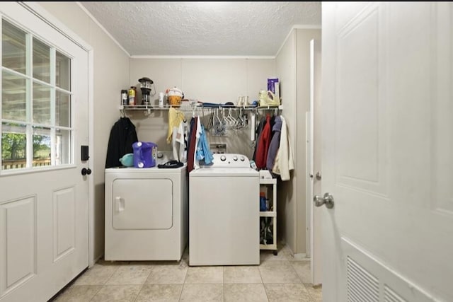 2745 Farris Branch Rd, Wallingford, KY 41093 - washroom featuring washing machine and dryer, a textured ceiling, crown molding, and light tile patterned flooring