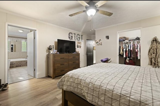 2745 Farris Branch Rd, Wallingford, KY 41093 - bedroom with wood finished floors, crown molding, a closet, a spacious closet, and ensuite bathroom