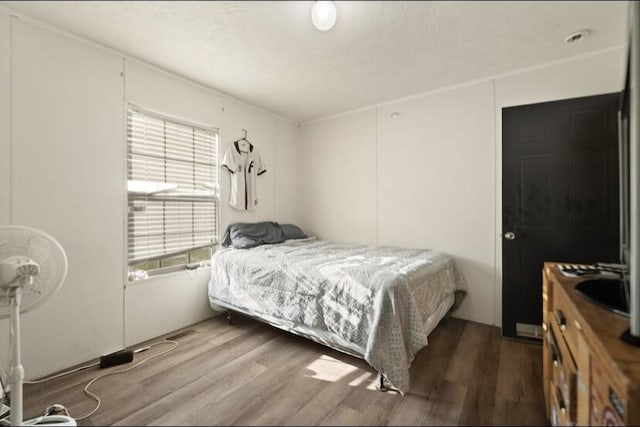 2745 Farris Branch Rd, Wallingford, KY 41093 - bedroom with wood finished floors and a textured ceiling