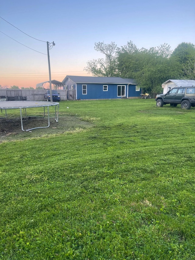 view of yard with a trampoline