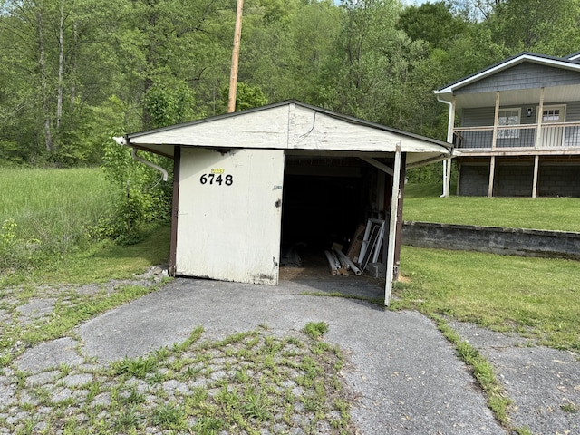 garage with a wooded view