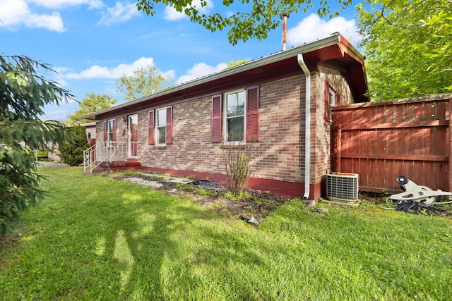88 Plum St, Stanton, KY 40380 - view of side of home with brick siding and central air condition unit