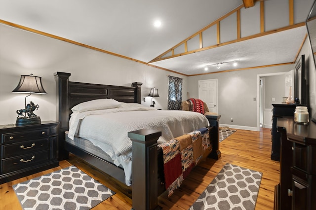 88 Plum St, Stanton, KY 40380 - bedroom with hardwood / wood-style flooring, crown molding, baseboards, and high vaulted ceiling