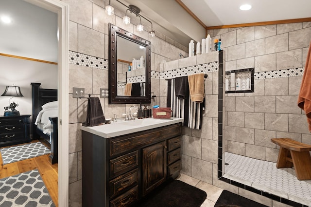 88 Plum St, Stanton, KY 40380 - ensuite bathroom with tile walls, a walk in shower, wood finished floors, vanity, and recessed lighting