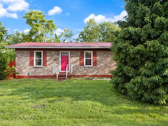 88 Plum St, Stanton, KY 40380 - ranch-style house featuring a front yard, brick siding, and metal roof
