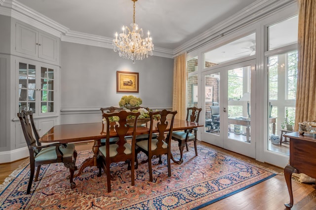 101 Idle Hour Dr Unit 1, Lexington, KY 40502 - dining room with a chandelier, ornamental molding, french doors, and wood finished floors