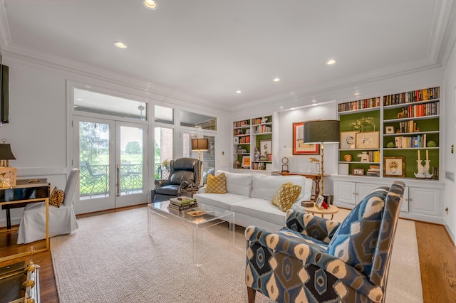 101 Idle Hour Dr Unit 1, Lexington, KY 40502 - living room featuring crown molding, built in shelves, recessed lighting, light wood-style floors, and french doors