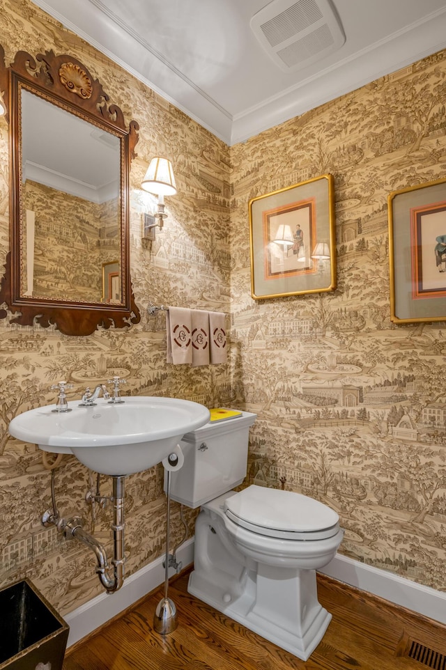 101 Idle Hour Dr Unit 1, Lexington, KY 40502 - bathroom with wood finished floors, baseboards, toilet, and ornamental molding