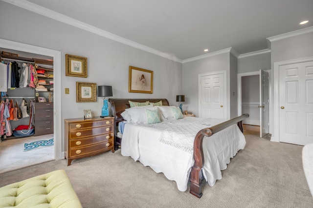 101 Idle Hour Dr Unit 1, Lexington, KY 40502 - carpeted bedroom with ornamental molding, a closet, recessed lighting, and a walk in closet