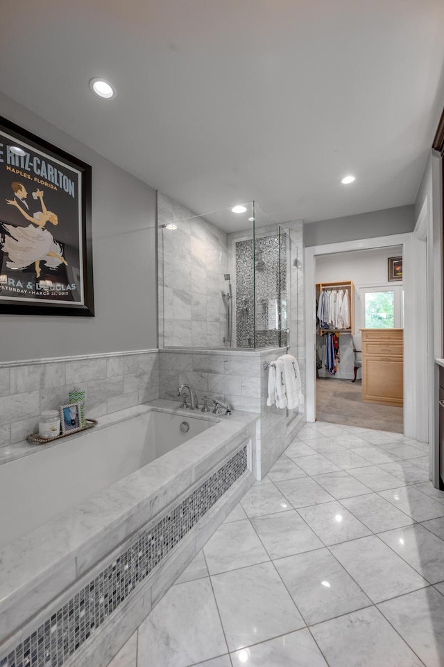101 Idle Hour Dr Unit 1, Lexington, KY 40502 - bathroom with a bath, tiled shower, and recessed lighting