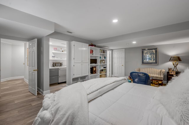 101 Idle Hour Dr Unit 1, Lexington, KY 40502 - bedroom with light wood-style floors, recessed lighting, and baseboards