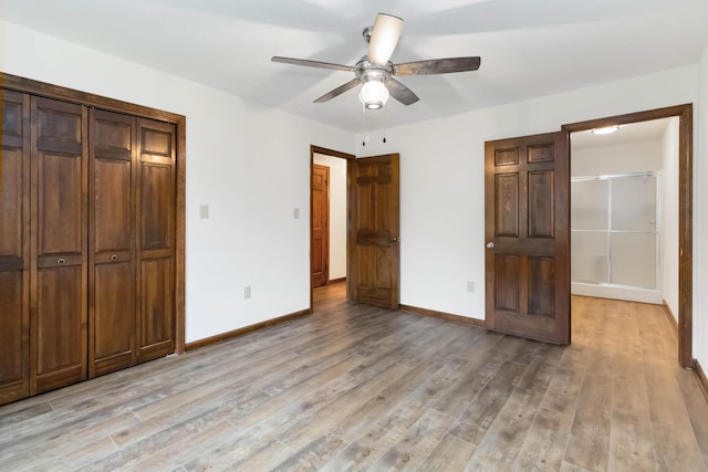 3716 Hickory Hill Dr, Somerset, KY 42503 - unfurnished bedroom with a closet, light wood-style floors, baseboards, and ceiling fan