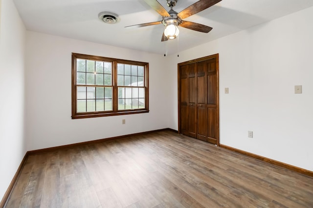 3716 Hickory Hill Dr, Somerset, KY 42503 - spare room with ceiling fan, baseboards, light wood-type flooring, and visible vents