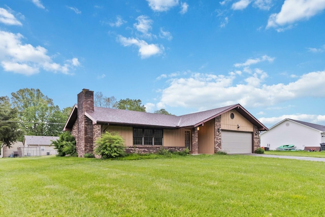 3716 Hickory Hill Dr, Somerset, KY 42503 - ranch-style house with an attached garage, a front lawn, a chimney, and driveway