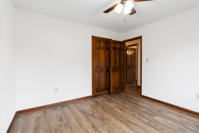 3716 Hickory Hill Dr, Somerset, KY 42503 - spare room with light wood-style floors, baseboards, and a ceiling fan