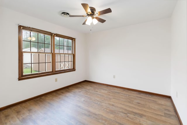 3716 Hickory Hill Dr, Somerset, KY 42503 - unfurnished room featuring baseboards, ceiling fan, and wood finished floors
