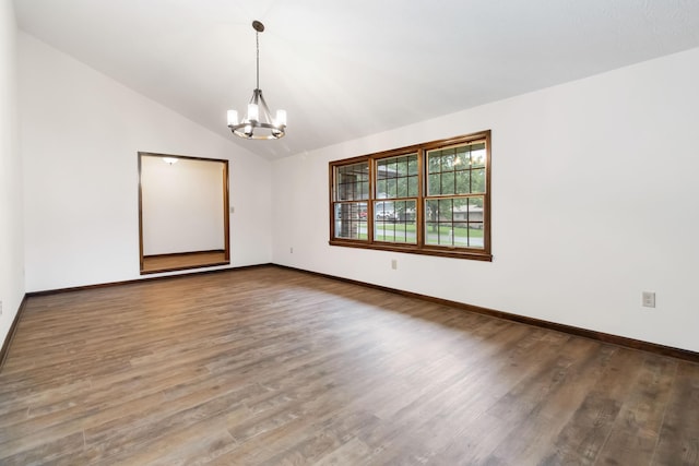 3716 Hickory Hill Dr, Somerset, KY 42503 - spare room with lofted ceiling, baseboards, a chandelier, and wood finished floors