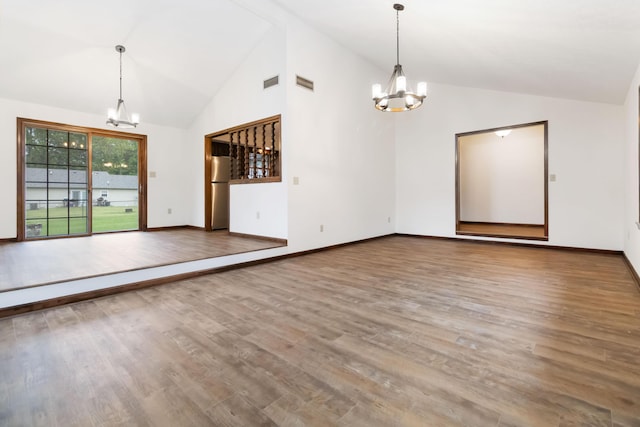 3716 Hickory Hill Dr, Somerset, KY 42503 - interior space with an inviting chandelier, visible vents, wood finished floors, and high vaulted ceiling