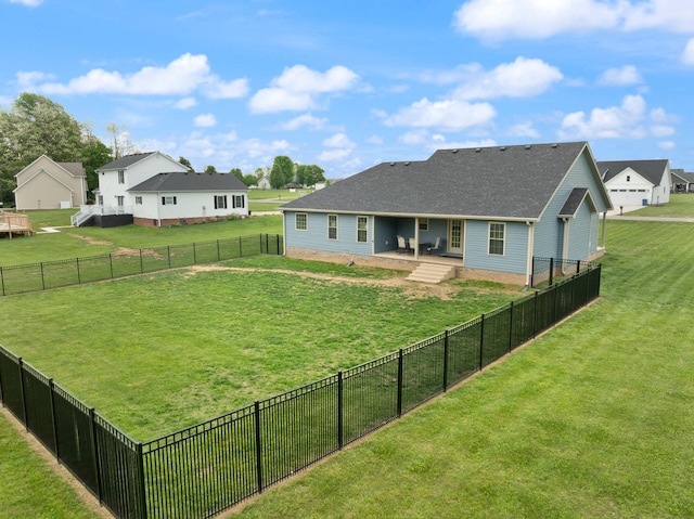 view of yard with a fenced backyard