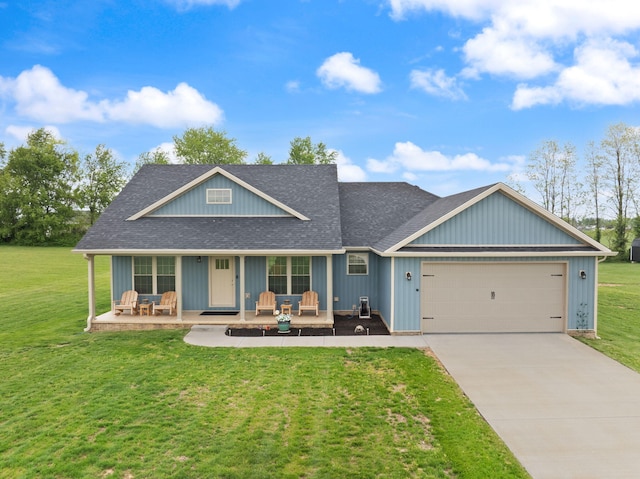 view of front of property with an attached garage, a shingled roof, concrete driveway, a front yard, and a porch