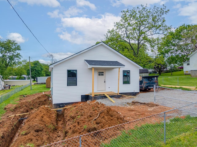 301 Meece St, Somerset, KY 42501 - bungalow-style home with fence, gravel driveway, and roof with shingles