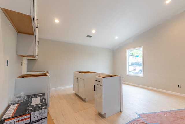301 Meece St, Somerset, KY 42501 - kitchen with light wood-type flooring, lofted ceiling, recessed lighting, and baseboards