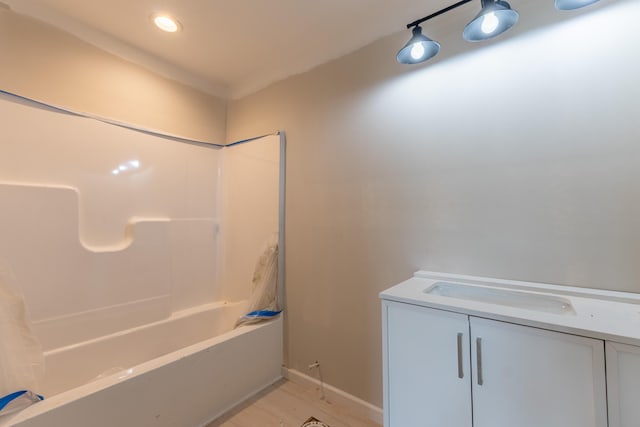 301 Meece St, Somerset, KY 42501 - bathroom with tub / shower combination, wood finished floors, baseboards, vanity, and recessed lighting