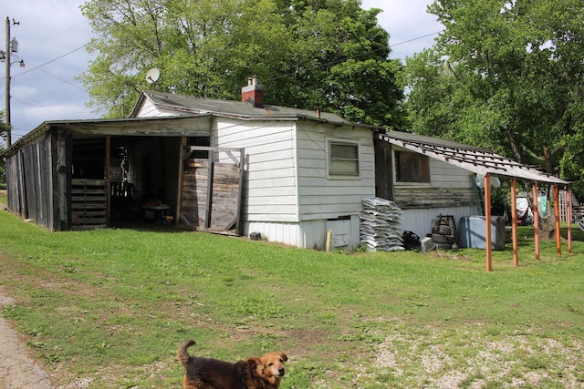 exterior space featuring a lawn