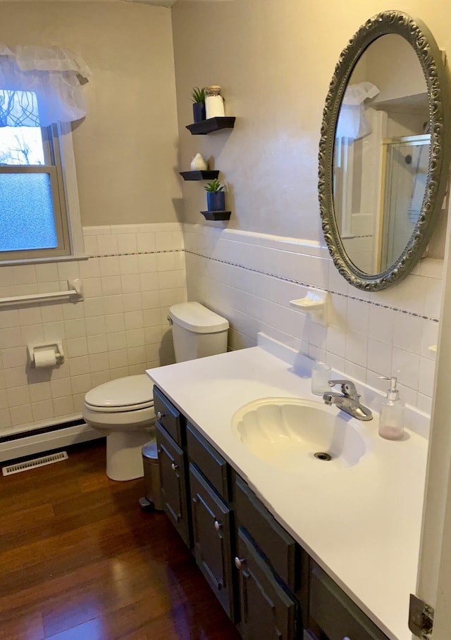 114 Lone Oak Dr, Nicholasville, KY 40356 - bathroom featuring a shower stall, wood finished floors, toilet, and tile walls