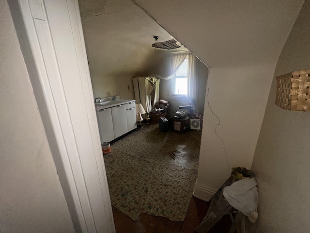 bonus room featuring lofted ceiling