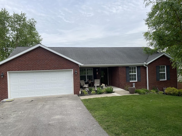 1166 Devane Ln, Frankfort, KY 40601 - ranch-style house with driveway, brick siding, a front lawn, and a shingled roof