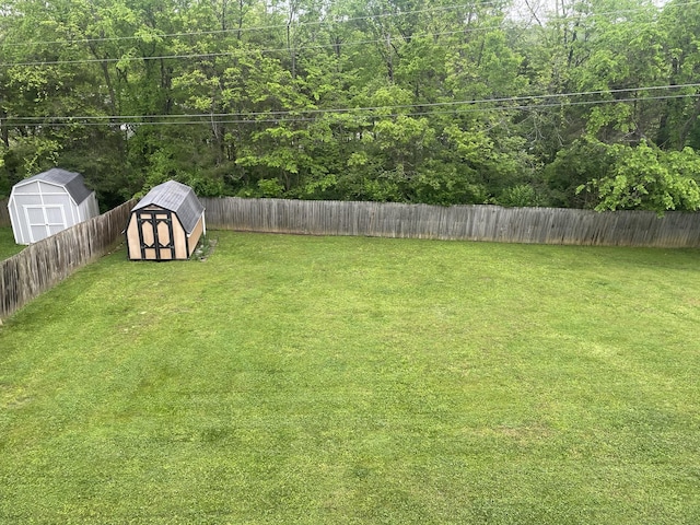 1166 Devane Ln, Frankfort, KY 40601 - view of yard featuring a storage unit and an outbuilding