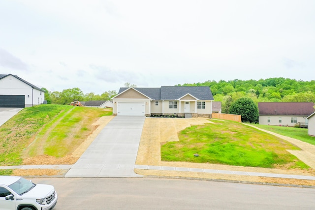 ranch-style house with concrete driveway, a front yard, and an attached garage