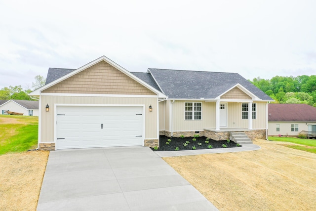 view of front of property featuring a garage, driveway, a porch, roof with shingles, and a front lawn