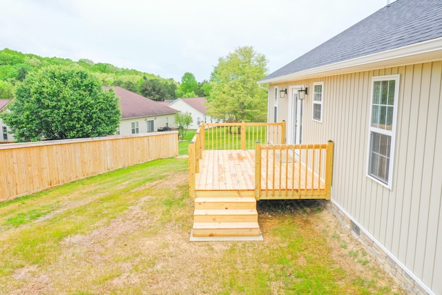 view of yard featuring a wooden deck