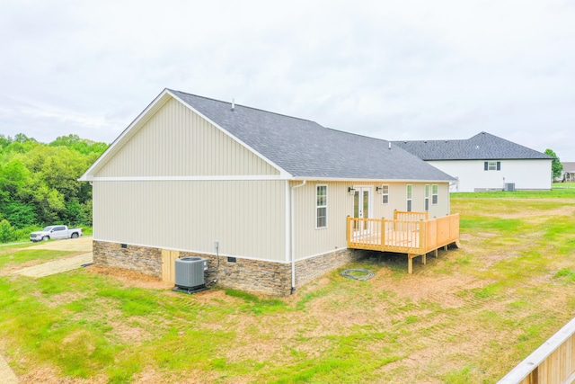 back of house with roof with shingles, a wooden deck, central air condition unit, and crawl space