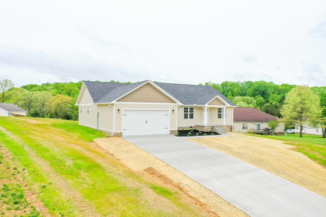 view of front of home featuring an attached garage, concrete driveway, a front lawn, and board and batten siding