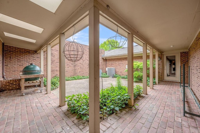 view of patio featuring central AC