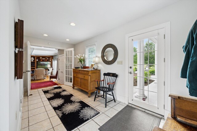 living room with light wood-type flooring, a fireplace, a ceiling fan, beam ceiling, and recessed lighting