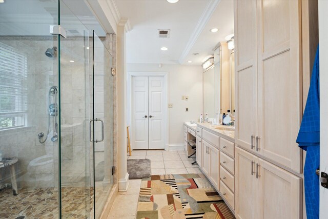 full bathroom with ornamental molding, tile patterned floors, a stall shower, and baseboards