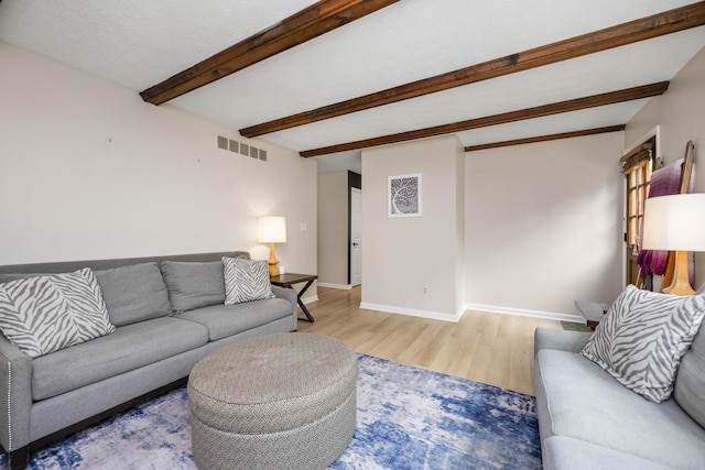 2912 Jason Ct, Lexington, KY 40503 - living area with light wood-style flooring, beam ceiling, and baseboards
