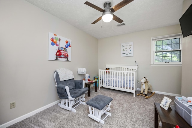 2912 Jason Ct, Lexington, KY 40503 - bedroom with a crib, carpet flooring, baseboards, and a textured ceiling