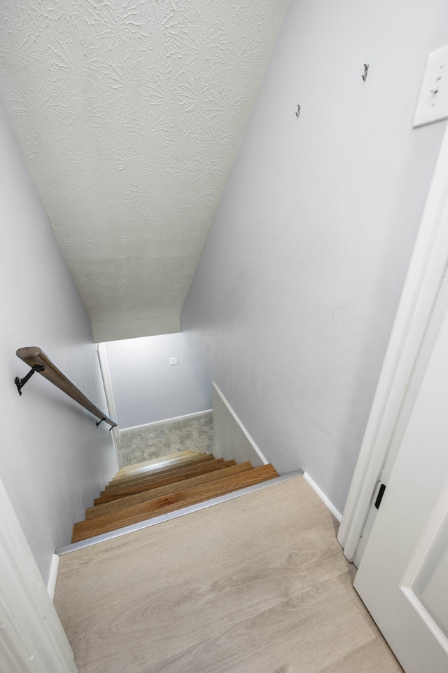 2912 Jason Ct, Lexington, KY 40503 - stairs with a textured ceiling and baseboards