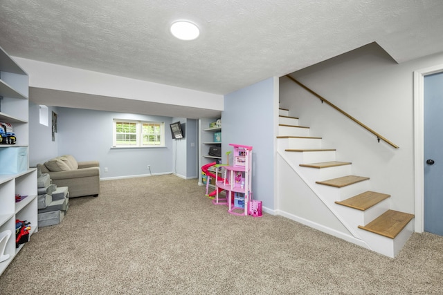 2912 Jason Ct, Lexington, KY 40503 - playroom with carpet floors, a textured ceiling, and baseboards